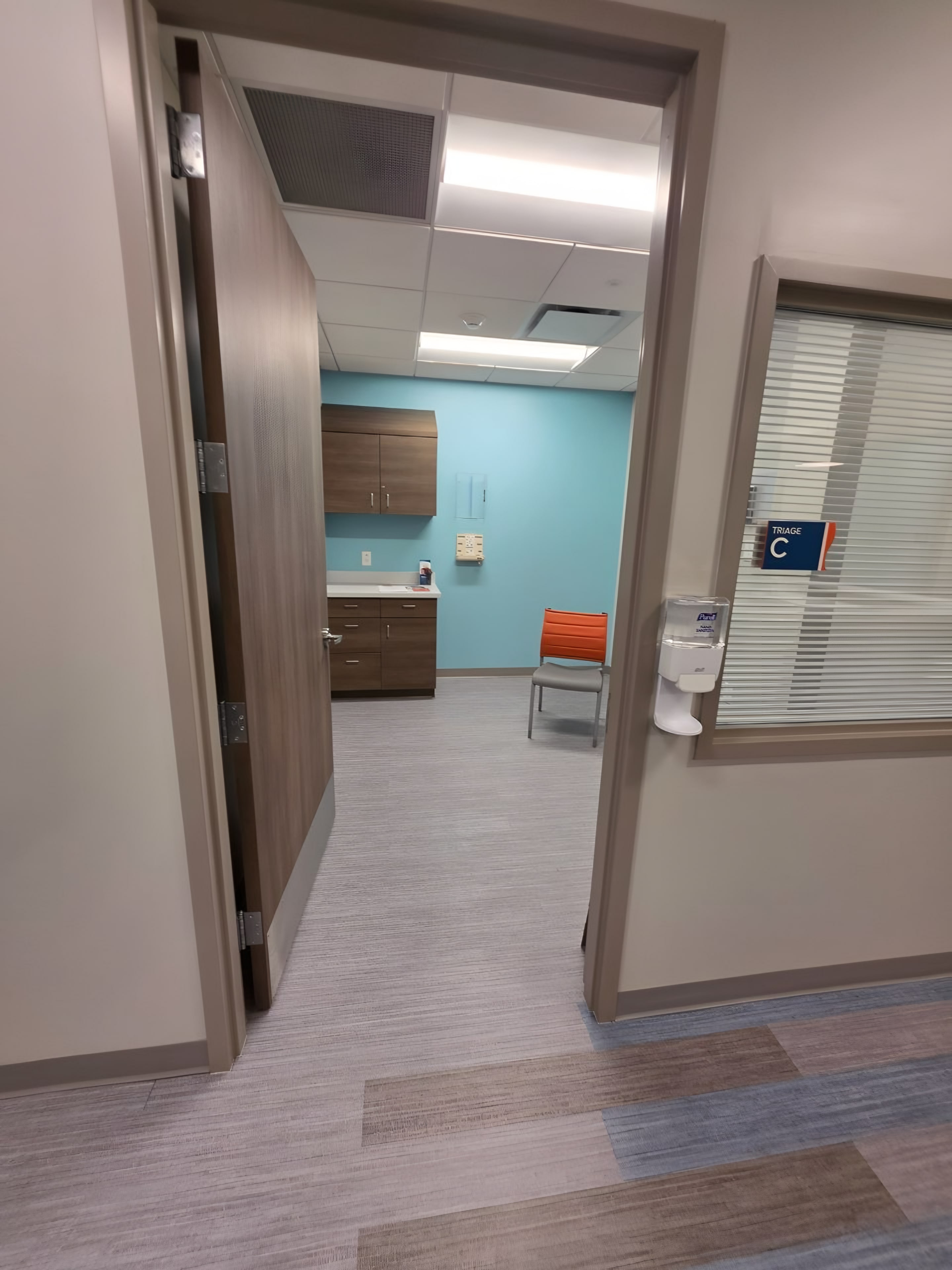 A painted corridor with framed art