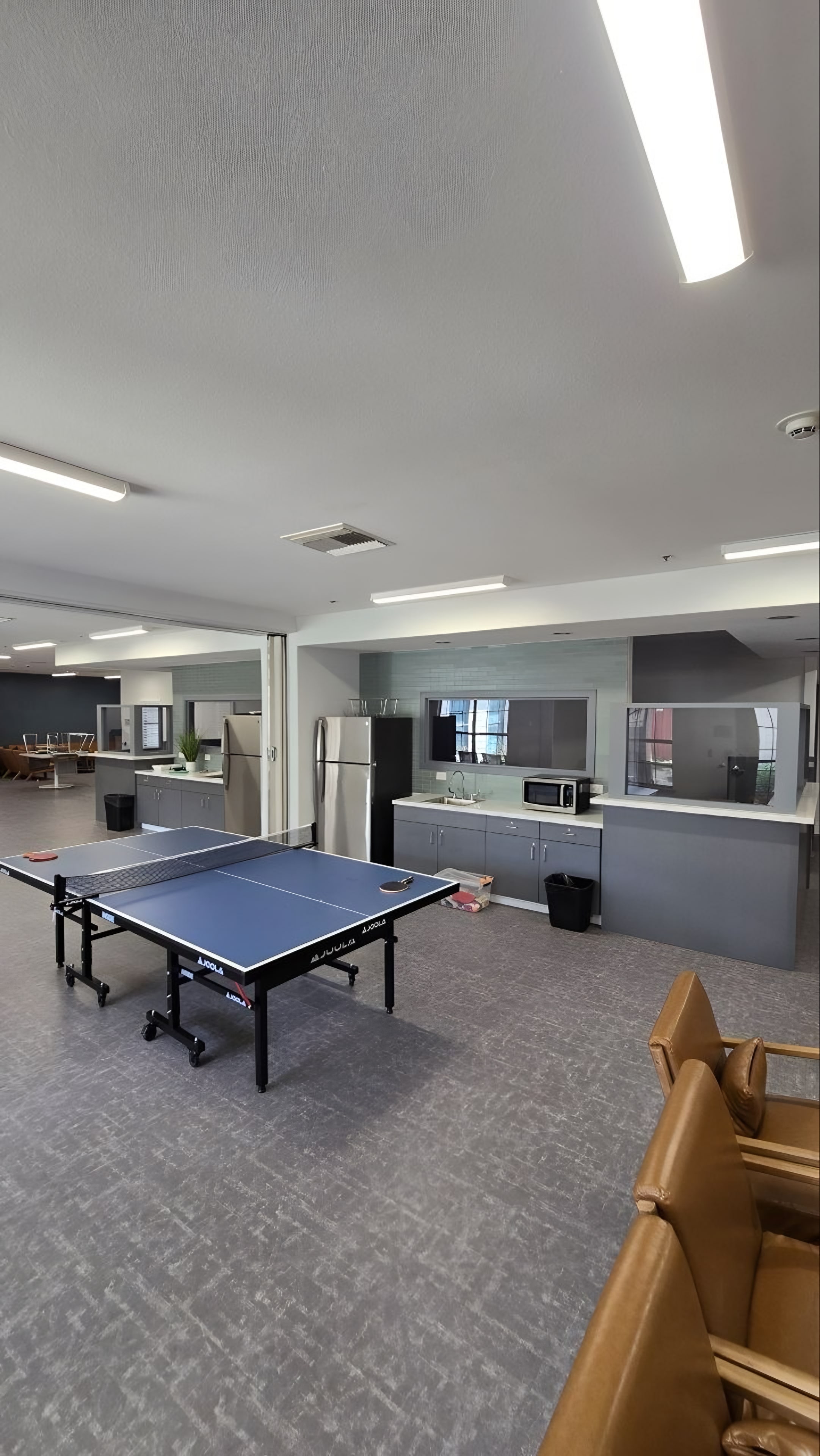 A large common room with seating groups
